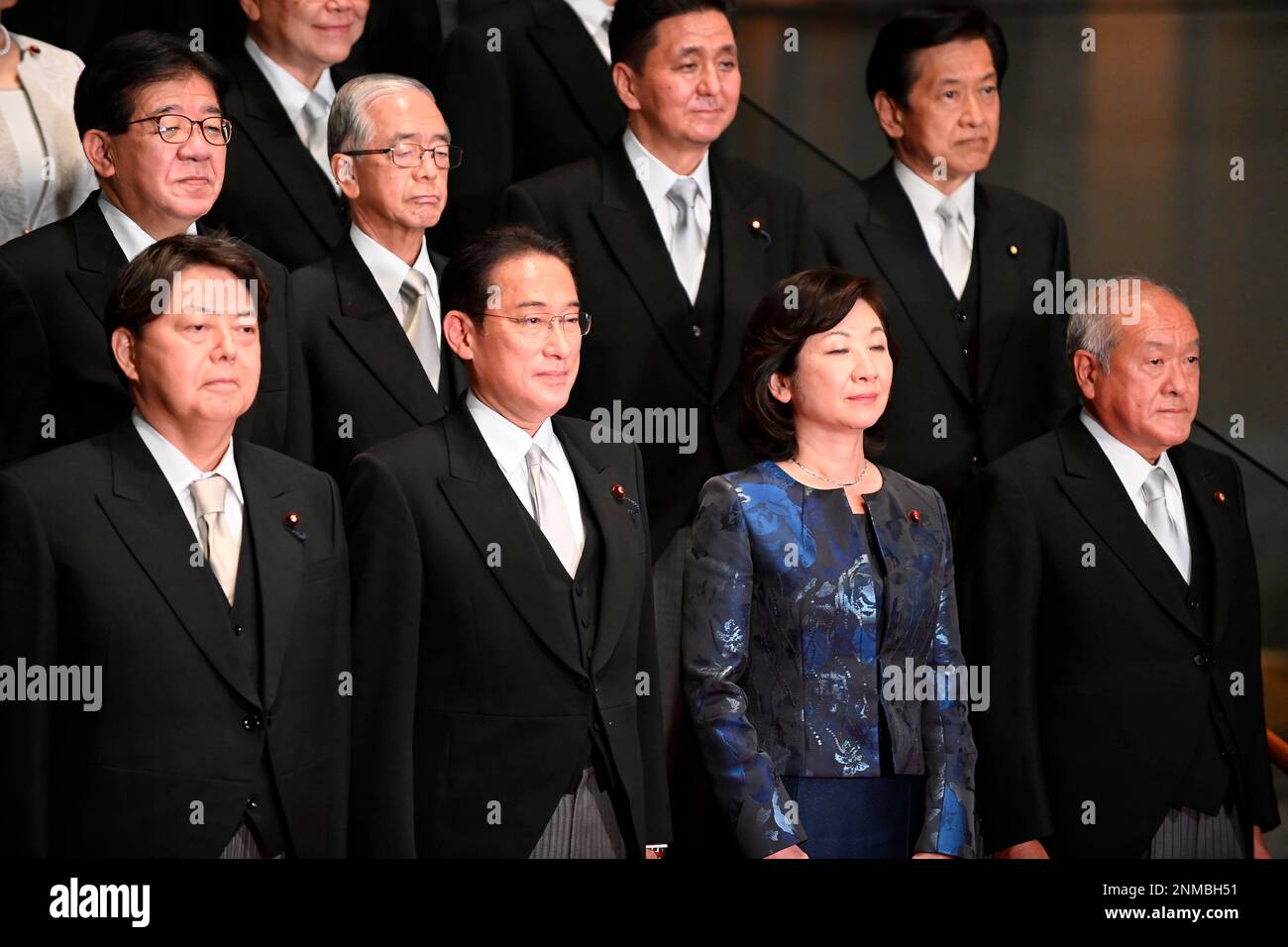 Japanese Prime Minister Fumio Kishida poses with his new cabinet ...