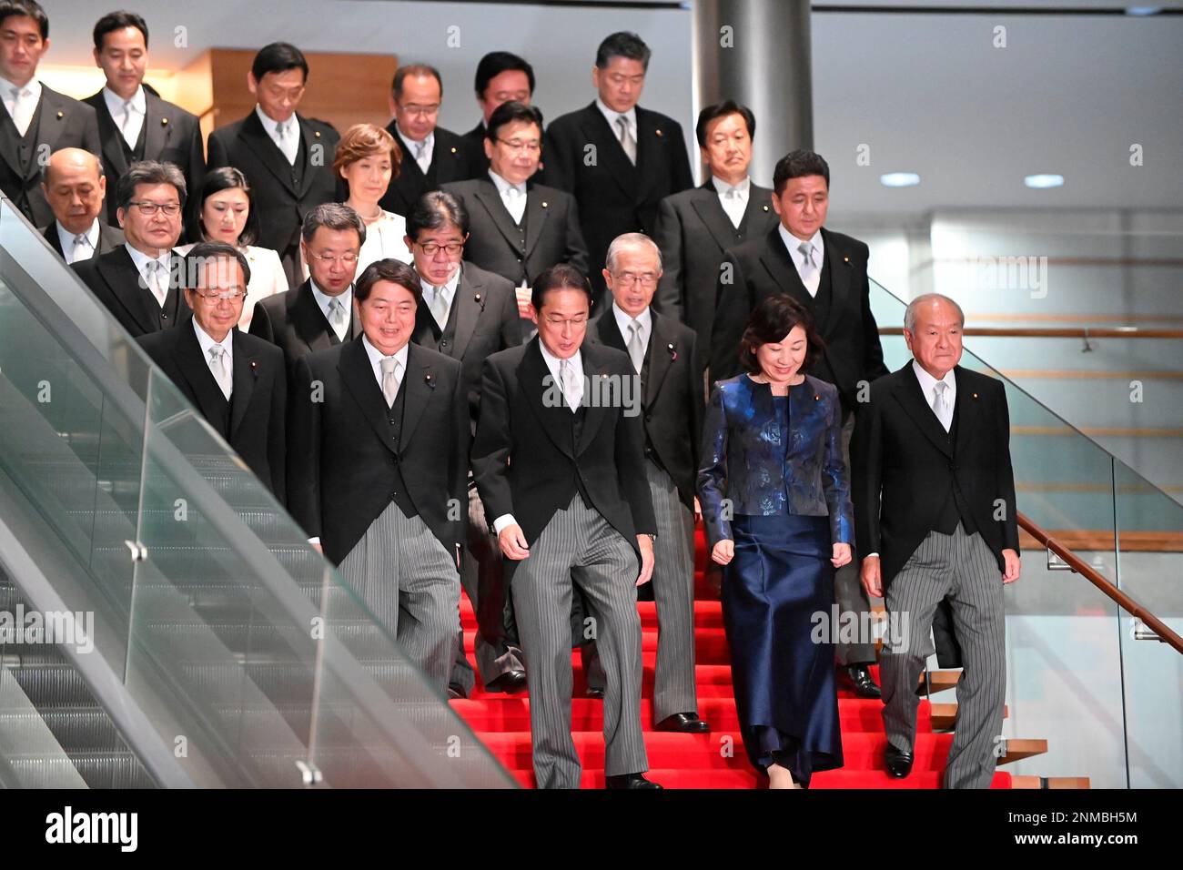 Japanese Prime Minister Fumio Kishida poses with his new cabinet ...