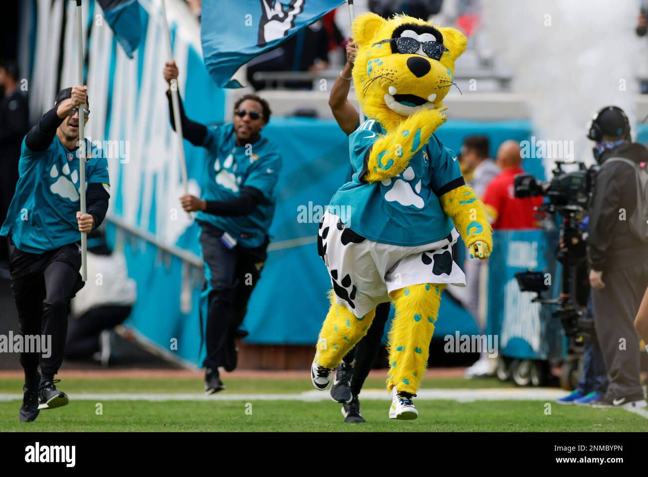 Jacksonville Jaguars mascot Jaxson De Ville holds a Buffalo Bills