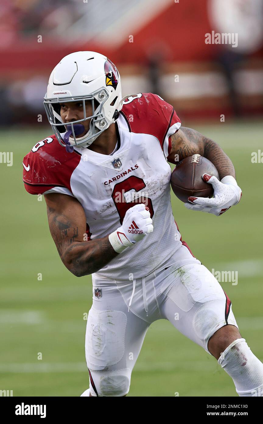 Arizona Cardinals head coach Kliff Kingsbury talks center Billy Price (53)  before an NFL football game against the San Francisco 49ers, Monday, Nov. 21,  2022, in Mexico City. (AP Photo/Fernando Llano Stock