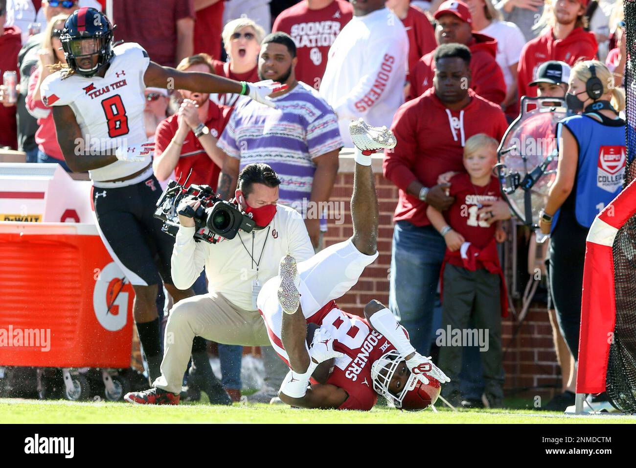 Texas Tech defensive back Malik Dunlap 8 and Oklahoma wide