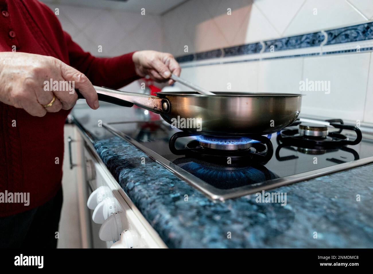 A person cooks over a butane gas stove fire, on October 28, 2021, in  Madrid, Spain. The Consumer Price Index (CPI) rose 2% in October from the  previous month and shot its