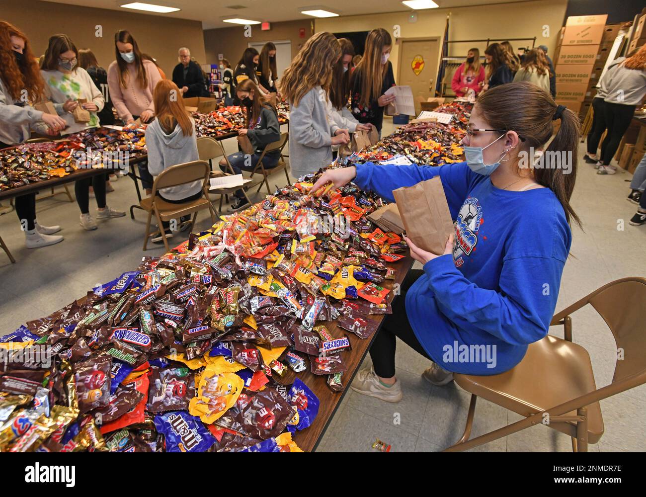 Richland High School senior Madeline Ringler bags candy at the Richland