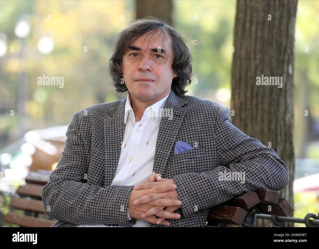 The writer Mircea Cartarescu poses after an interview for the publication  of his work 'Essential Poetry', in the Nabuco cafeteria, on October 26,  2021, in Madrid (Spain). The book brings together for