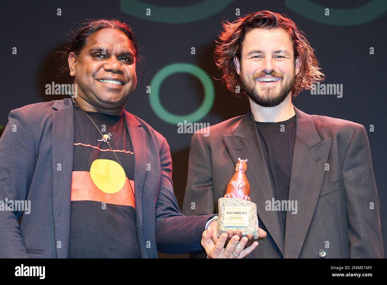Berlin, Germany. 24th Feb, 2023. Derik Lynch (l) and film writer Matthew Thorne are happy about the award in the category 'Best Short Film' at the 37th Teddy Awards ceremony on the sidelines of the Berlinale. The Teddy for Best Feature Film went to their Nigerian production 'All the Colours of the World Are Between Black and White.' The 73rd International Film Festival will take place in Berlin from Feb. 16-26, 2023. Credit: Annette Riedl/dpa/Alamy Live News Stock Photo