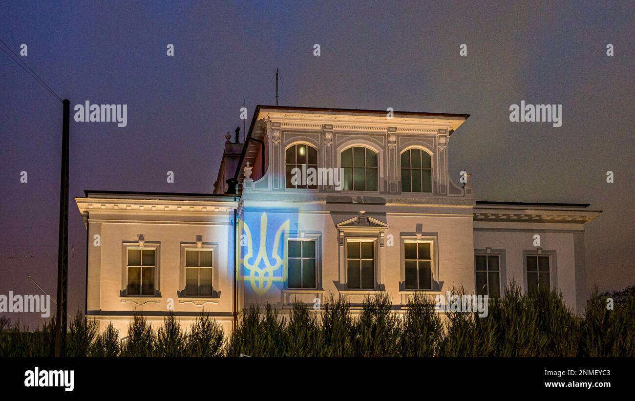 projection of an Ukrinian coat of arms on the facade of the Russian Embassy in Copenhagen on the 24th of february 2023 Stock Photo