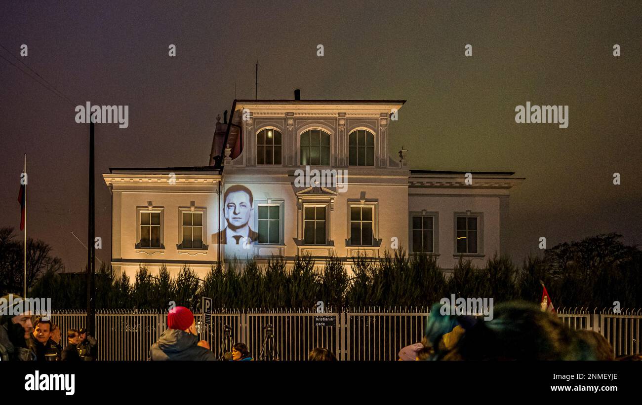 projection of an image of Volodymyr Zelenskyj on the facade of the Russian Embassy in Copenhagen, 24 February, 2023 Stock Photo