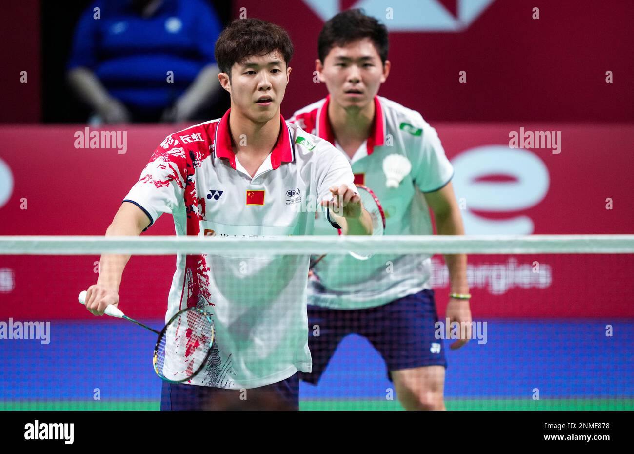 Chinas He Ji Ting, left, and Zhou Hao Dong in action during a mens double match in the Thomas Cup mens team final badminton match between China and Indonesia, in Aarhus, Denmark,