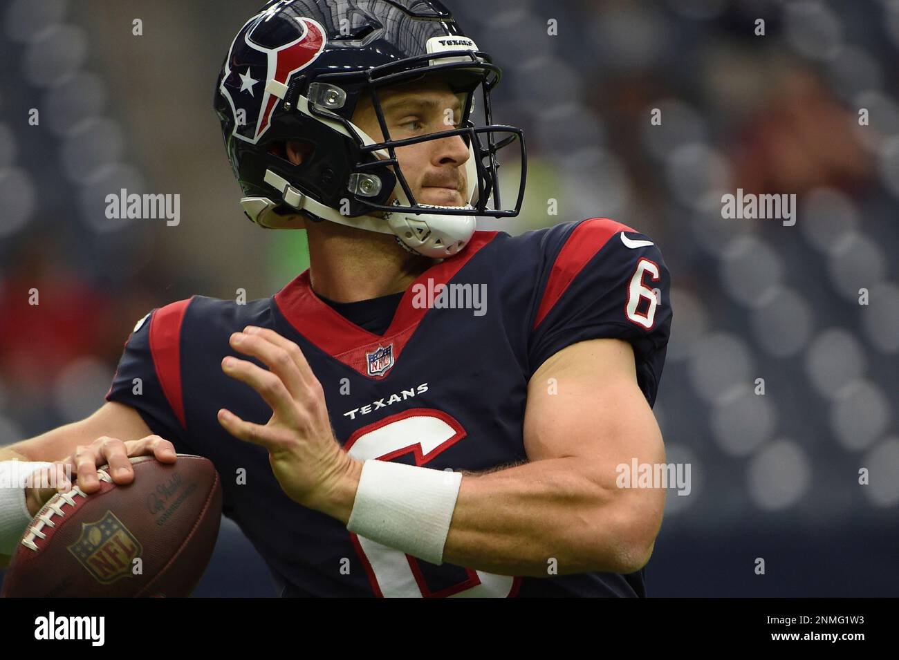 HOUSTON, TX - OCTOBER 10: Houston Texans quarterback Jeff Driskel (6) warms  up before the football game between the New England Patriots and Houston  Texans at NRG Stadium on October 10, 2021