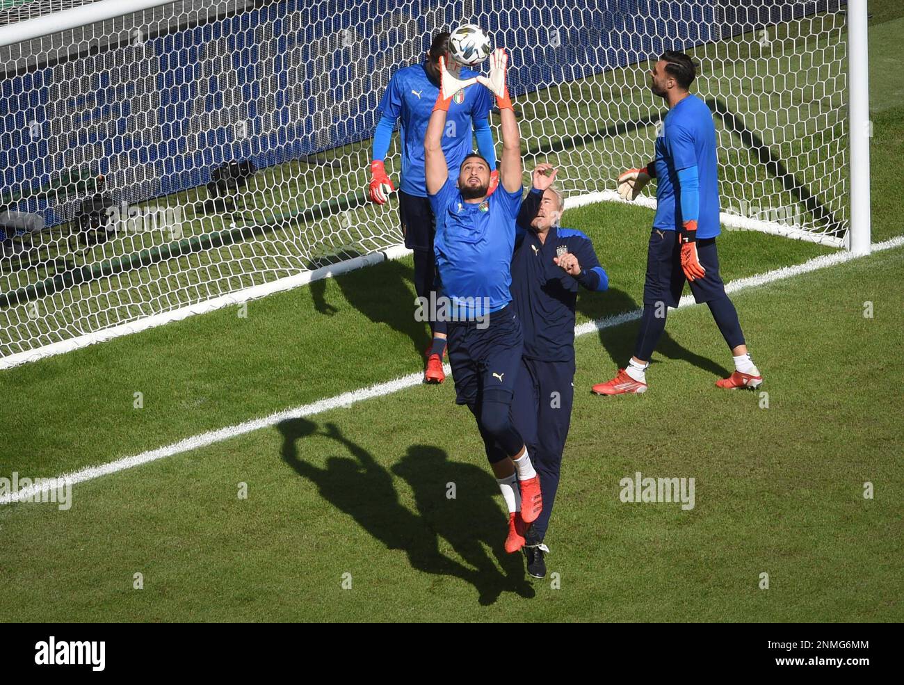 Italy players warm up prior to the UEFA Nations League third place soccer  match between Italy and Belgium at the Juventus stadium, in Turin, Italy,  Sunday, Oct. 10, 2021. (Massimo Rana/Pool Photo