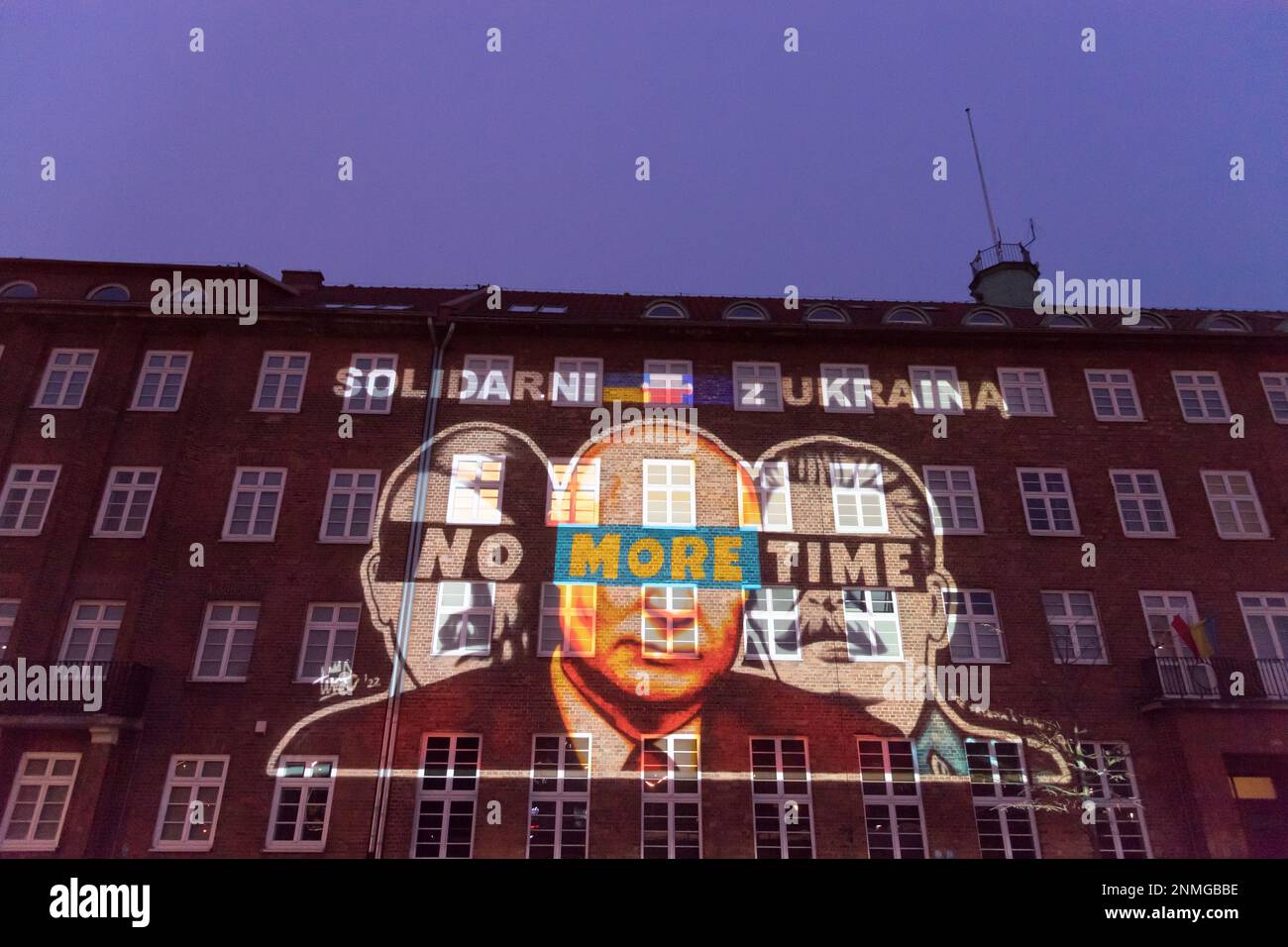 Gdansk, Poland. 24th February 2023. Adolf Hitler, Vladimir Putin and Joseph Stalin on anti-war mural of artist Tuse as a mapping in the first anniversary of the Russian invasion on Ukraine © Wojciech Strozyk / Alamy Live News *** Local Caption *** Stock Photo