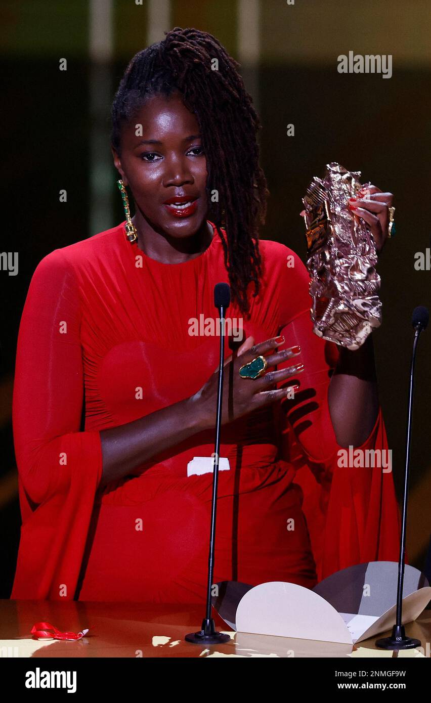 Director Alice Diop reacts as she receives the Best Debut Feature Award