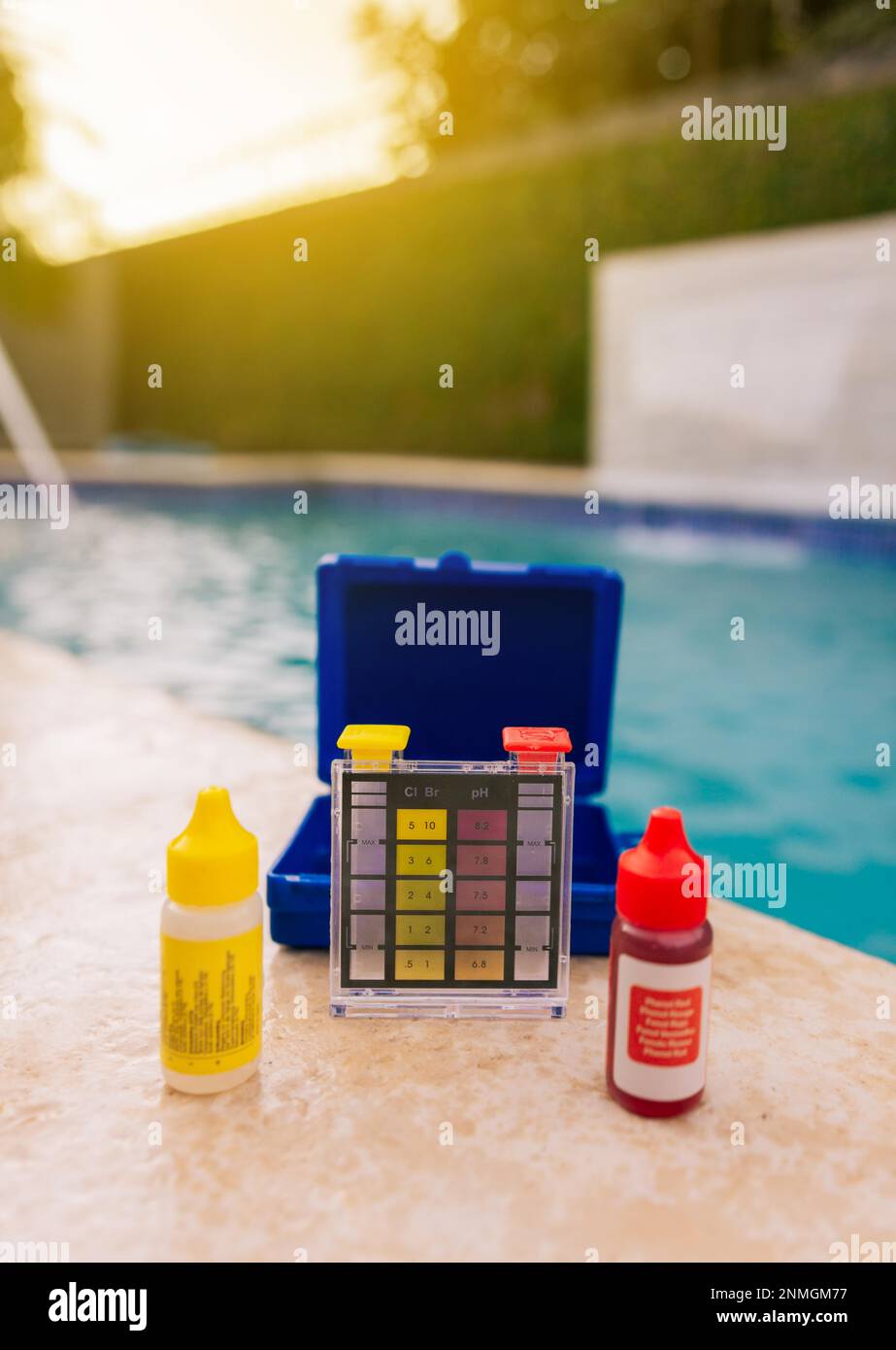 Chlorine test kit on the edge of the swimming pool Mini tester for pool Chlorine test kit on the edge of the swimming pool Mini tester for pool