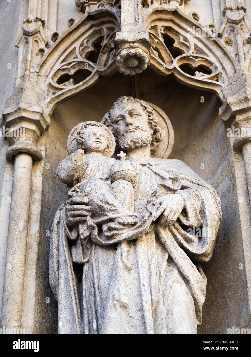 Figure of a saint, stone sculpture on the west portal, Graz Cathedral ...