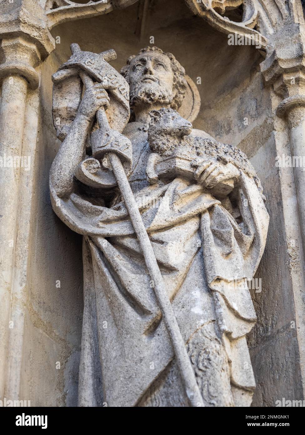 Figure of a saint, stone sculpture on the west portal, Graz Cathedral ...