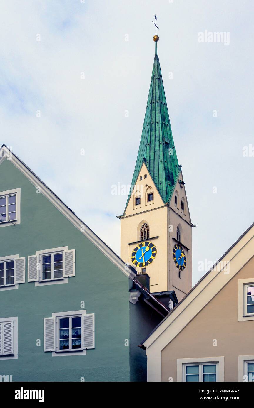 Pointed gable and steeple with clocks of the St. Mang Church, Kempten ...