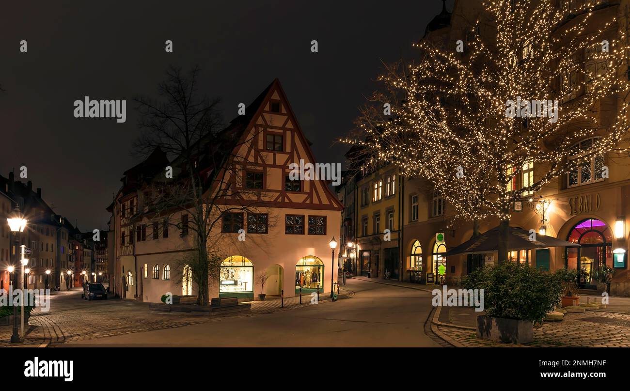 Historic bathhouse in evening illumination, Old Town Nuremberg, Middle Franconia, Bavaria, Germany Stock Photo