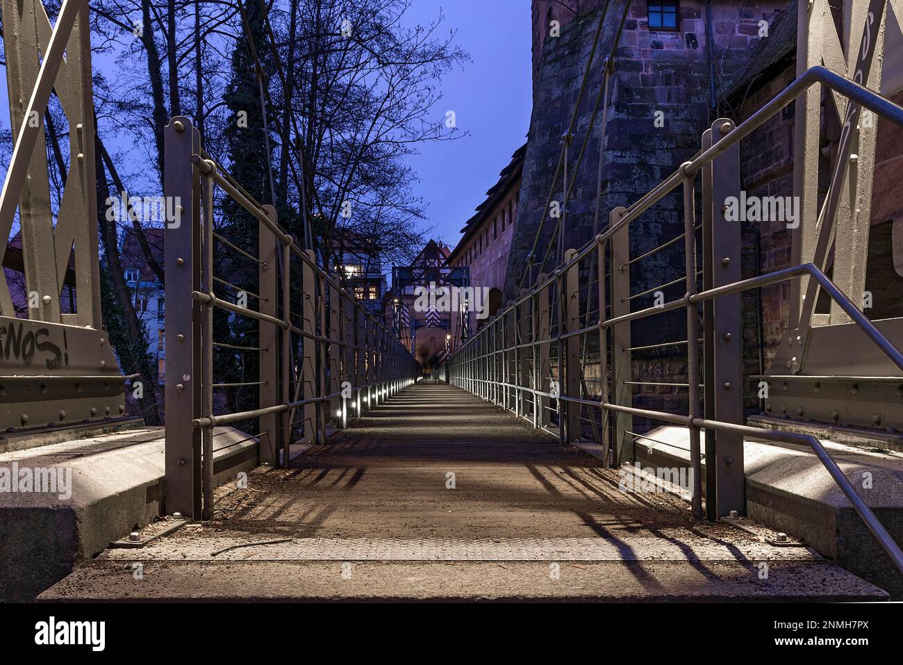 Chain footbridge in evening illumination, oldest preserved iron chain bridge in continental Europe, Nuremberg, Middle Franconia, Bavaria, Germany Stock Photo
