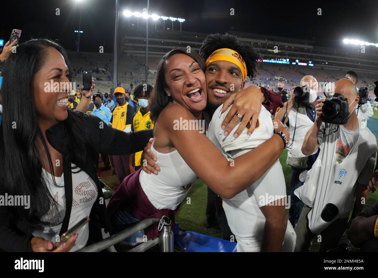 regina-jackson-left-celebrates-with-her-son-arizona-state-sun-devils-quarterback-jayden-daniels-5-afteran-ncaa-football-game-against-the-ucla-bruins-saturday-oct-2-2021-in-pasadena-calif-arizona-state-defeated-ucla-42=23-kirby-lee-via-ap-2NMH85A.jpg