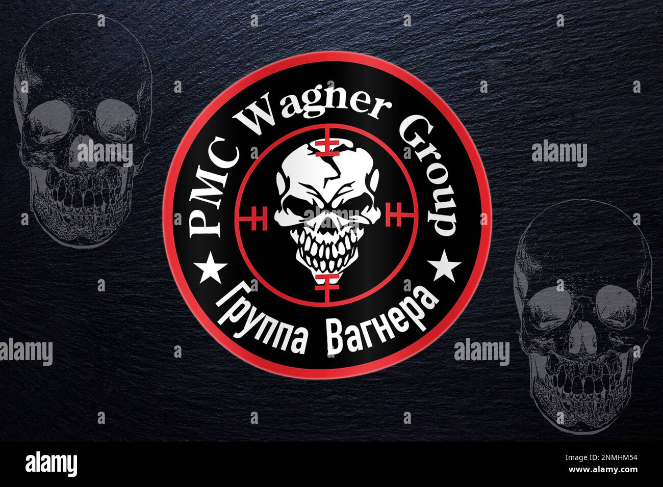 Logo of the Russian private security company and military enterprise Wagner Group (paramilitary organisation) on a black slate plate Stock Photo