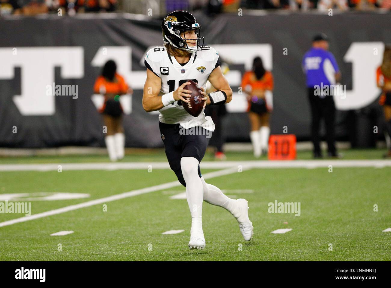 Cincinnati Bengals wide receiver Tee Higgins (85) and Jacksonville Jaguars  quarterback Trevor Lawrence (16) talk prior to an NFL football game,  Thursday, Sept. 30, 2021, in Cincinnati. (AP Photo/Emilee Chinn Stock Photo  - Alamy