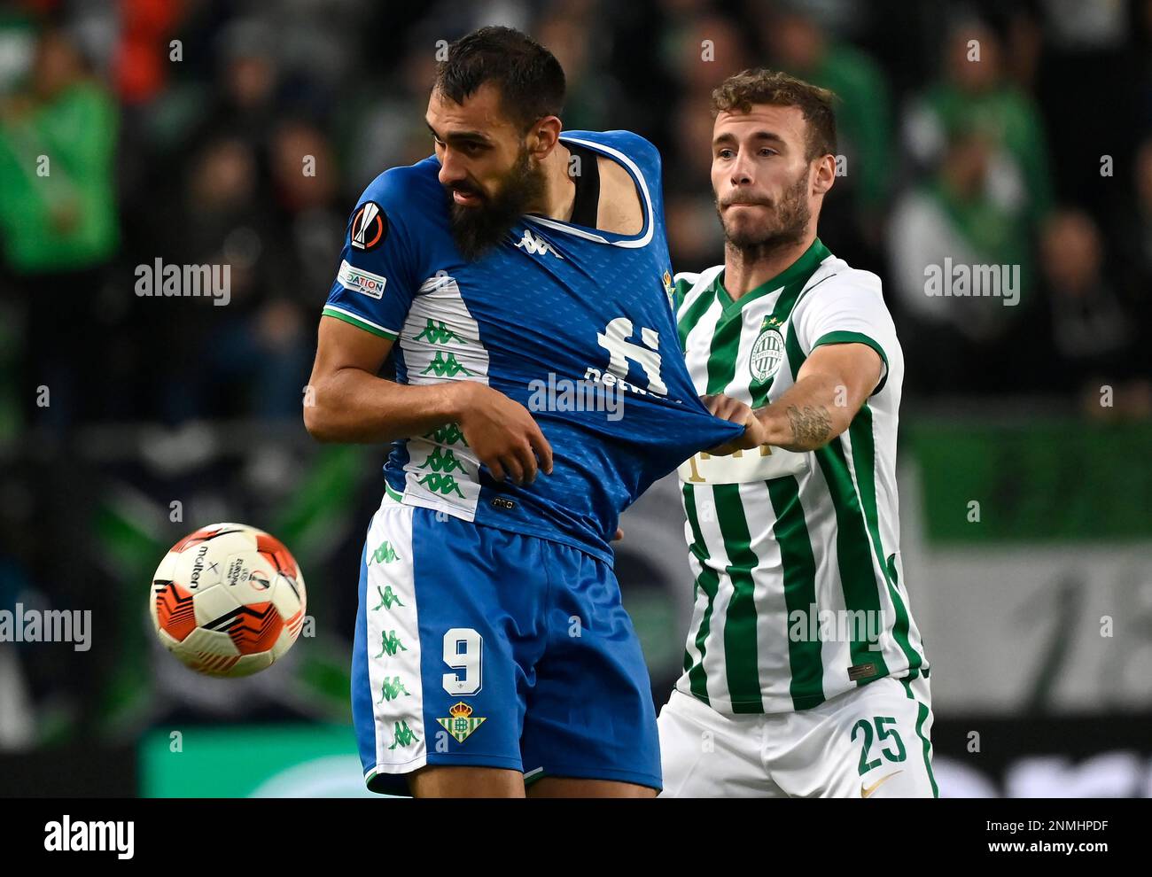 Borja Iglesias of Real Betis, left, and Miha Blazic of Ferencvaros TC vie  for the ball during the Europa League group G soccer match between Ferencvaros  TC and Real Betis in Groupama