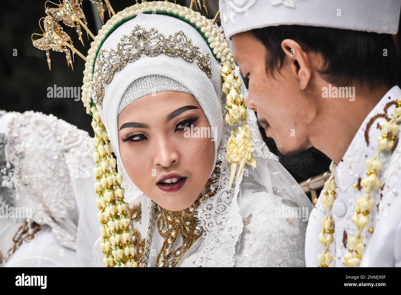 Bandung, Indonesia. 24th Feb, 2023. A couple with disabilities conduct ...