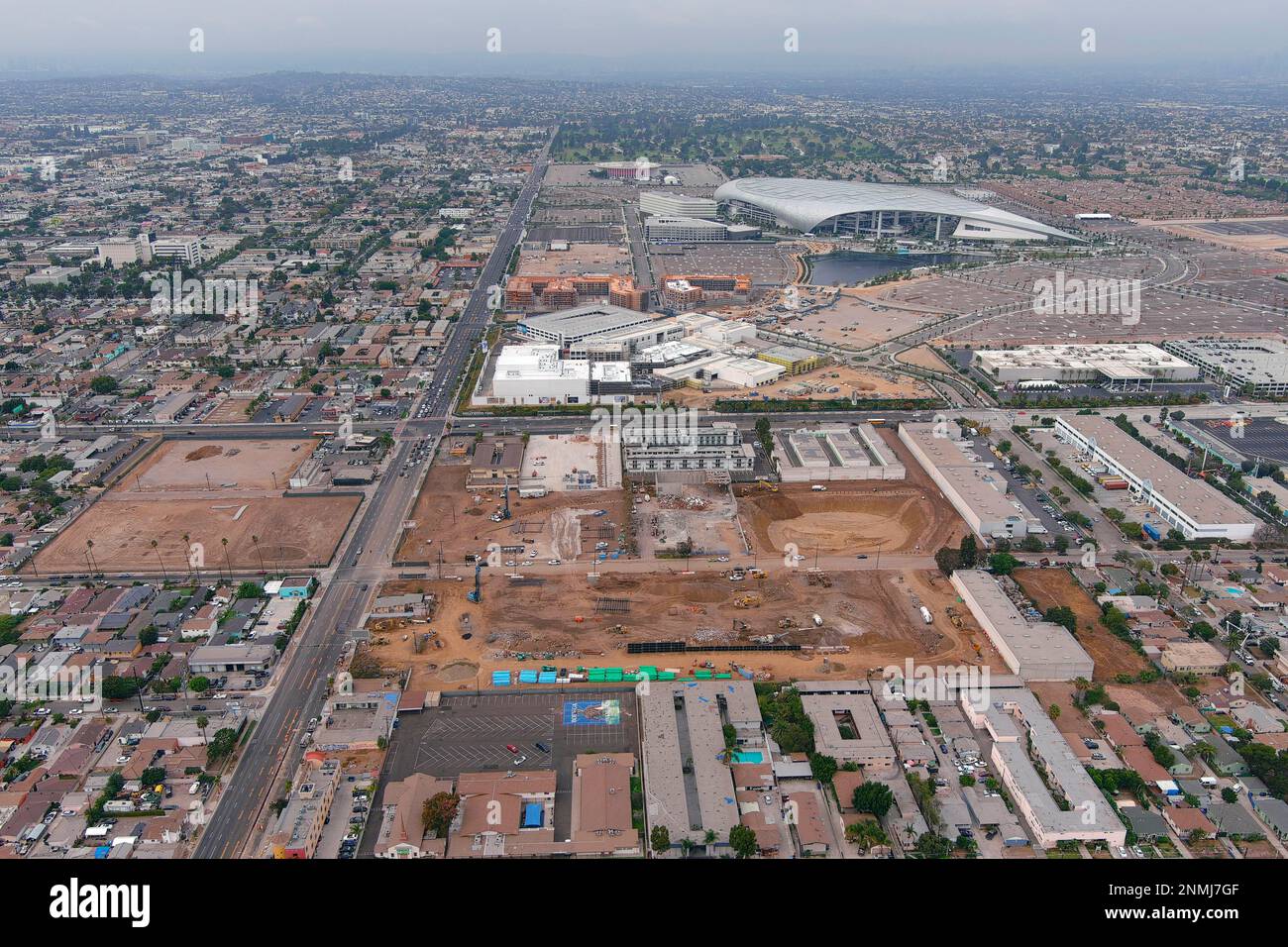 An aerial view of the Intuit Dome construction site with SoFi Stadium