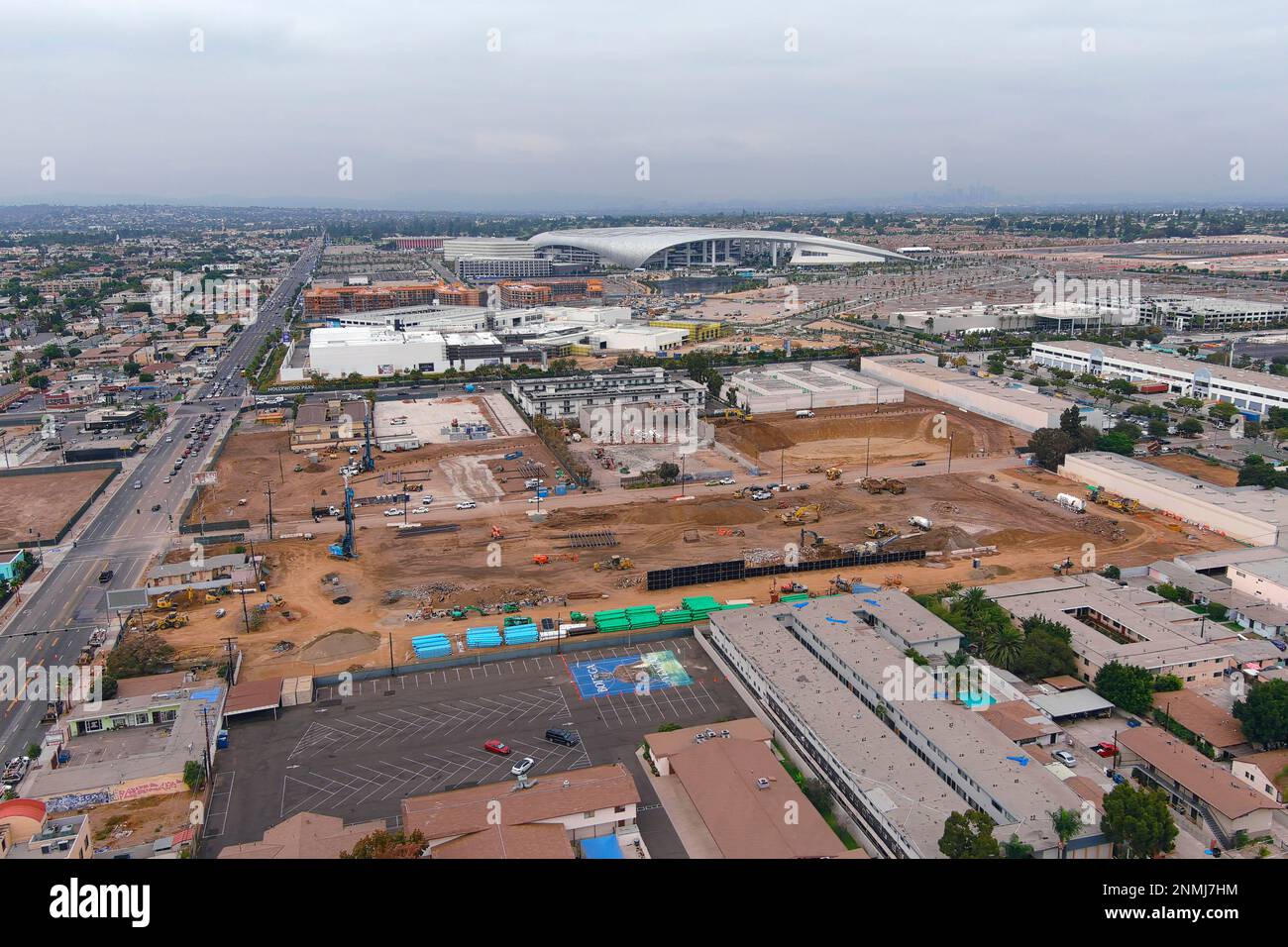 An aerial view of the Intuit Dome construction site with SoFi Stadium