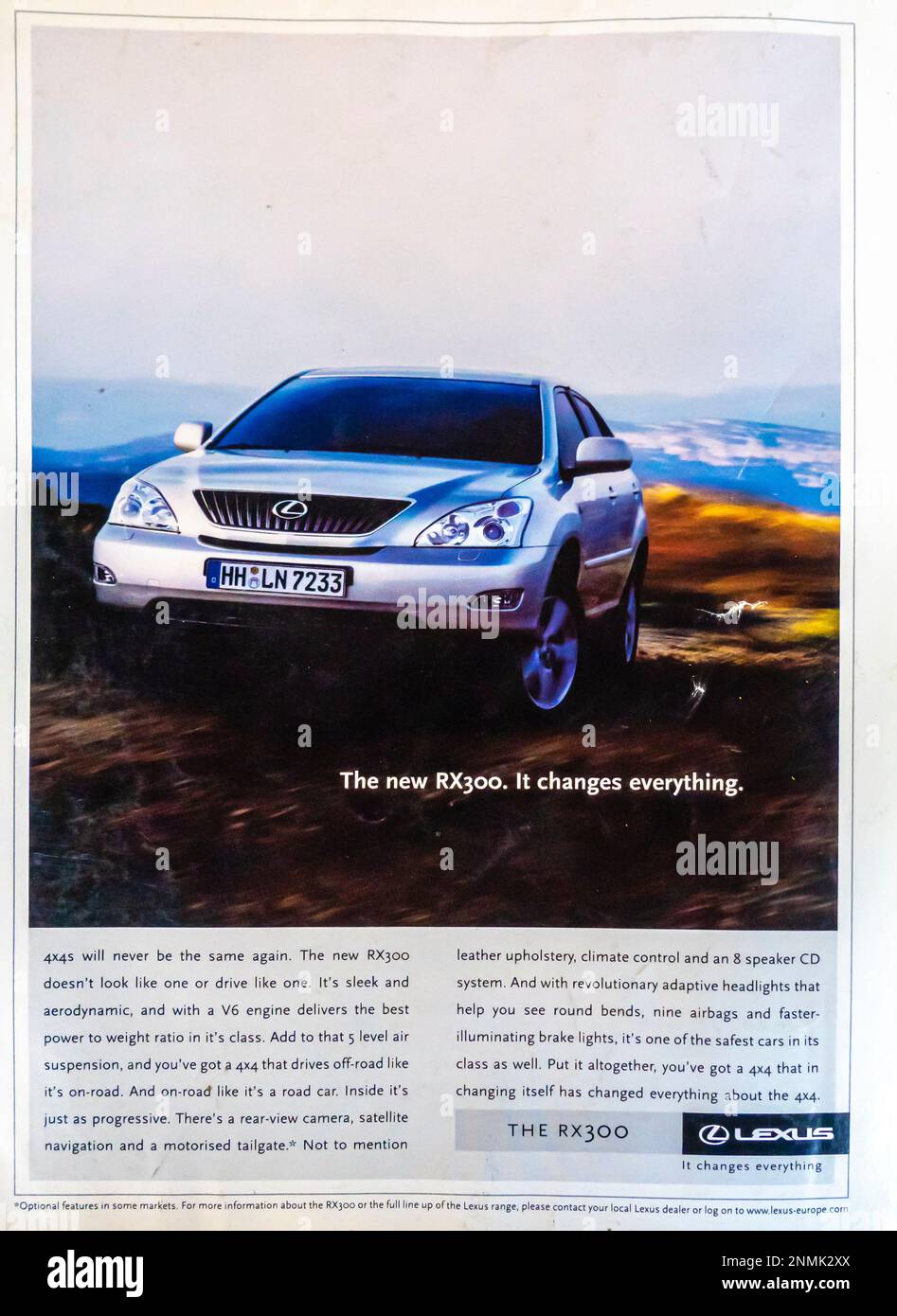 Lexus RX300 advert in a Natgeo magazine, July 2003 Stock Photo