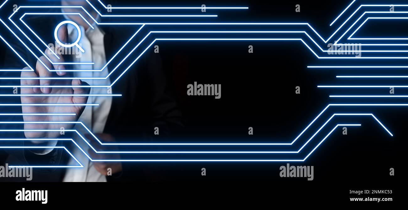 Lady In Suit Standing pressing On virtual button. Woman In Suit Standing Pointing On Futuristic Graphic Interface. Presenting Modern Virtual Stock Photo