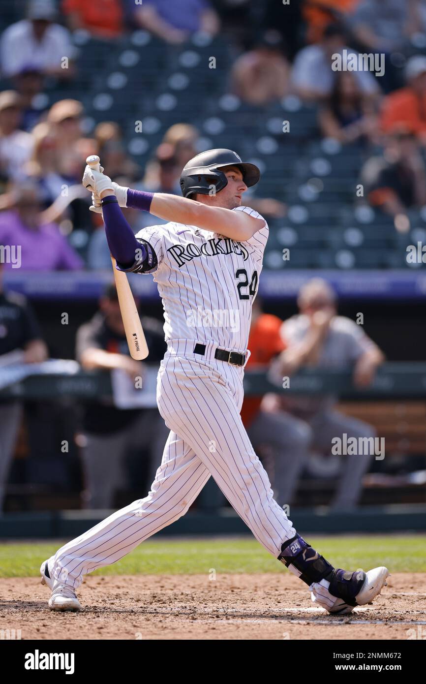 DENVER, CO - SEPTEMBER 08: Colorado Rockies first baseman C.J. Cron (25)  fields his position during an MLB game against the San Francisco Giants on  Sept. 8, 2021 at Coors Field in