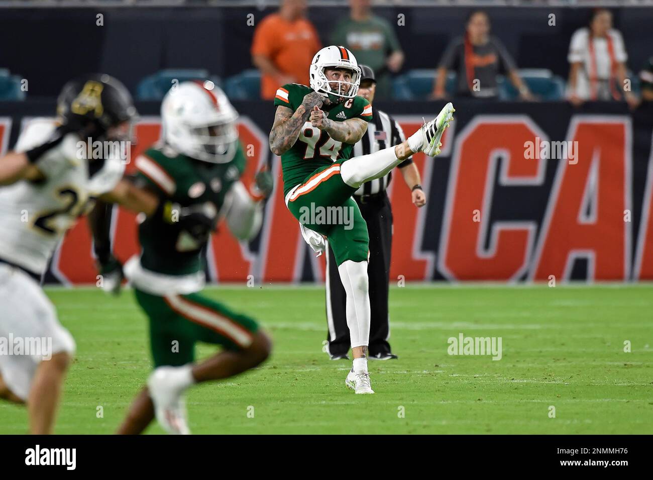 MIAMI GARDENS, FL - September 11: A Miami Dolphins helmet rests on the  sidelines during the game between the New England Patriots and the Miami  Dolphins, on Sunday, September 11, 2022 at