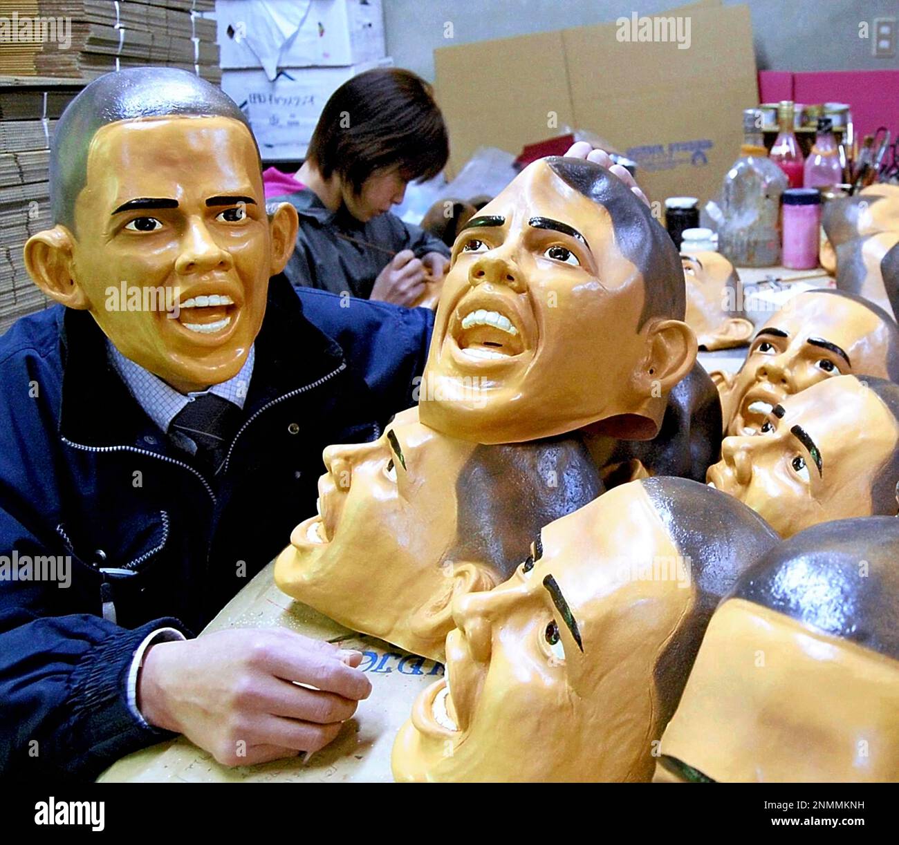 Workers of Ogawa Studios Co. are making rubber face masks of