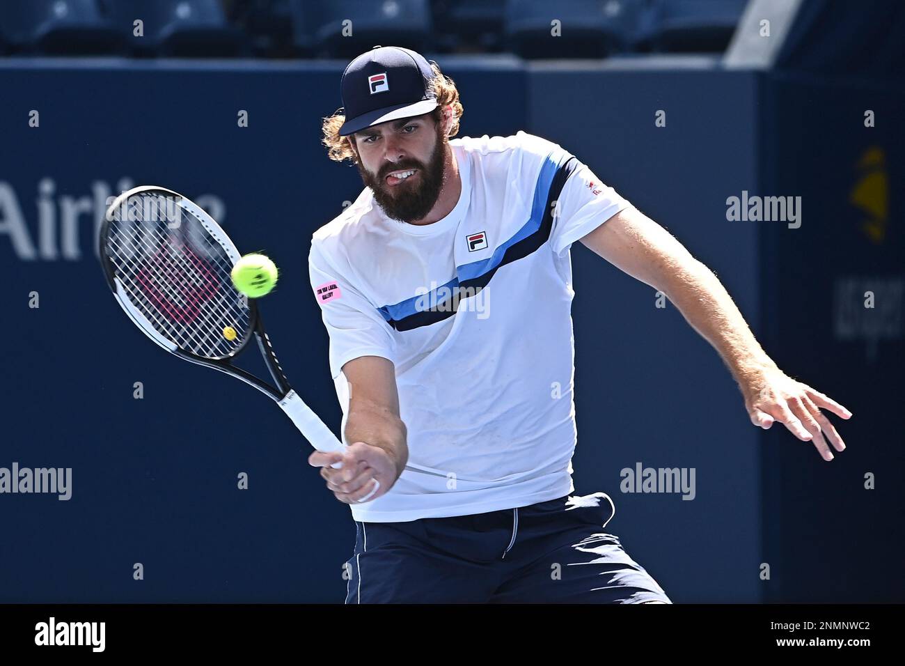 Reilly Opelka returns a shot during a Mens Singles match at the 2021 US Open, Monday, Sep