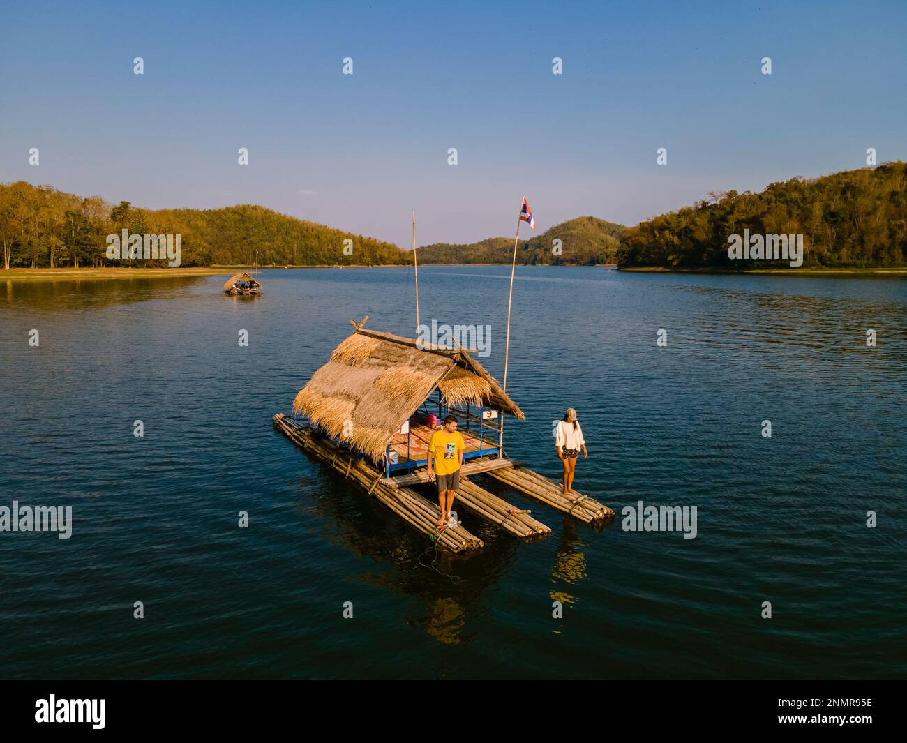 A couple of European men and Asian women visit Huai Krathing lake in ...