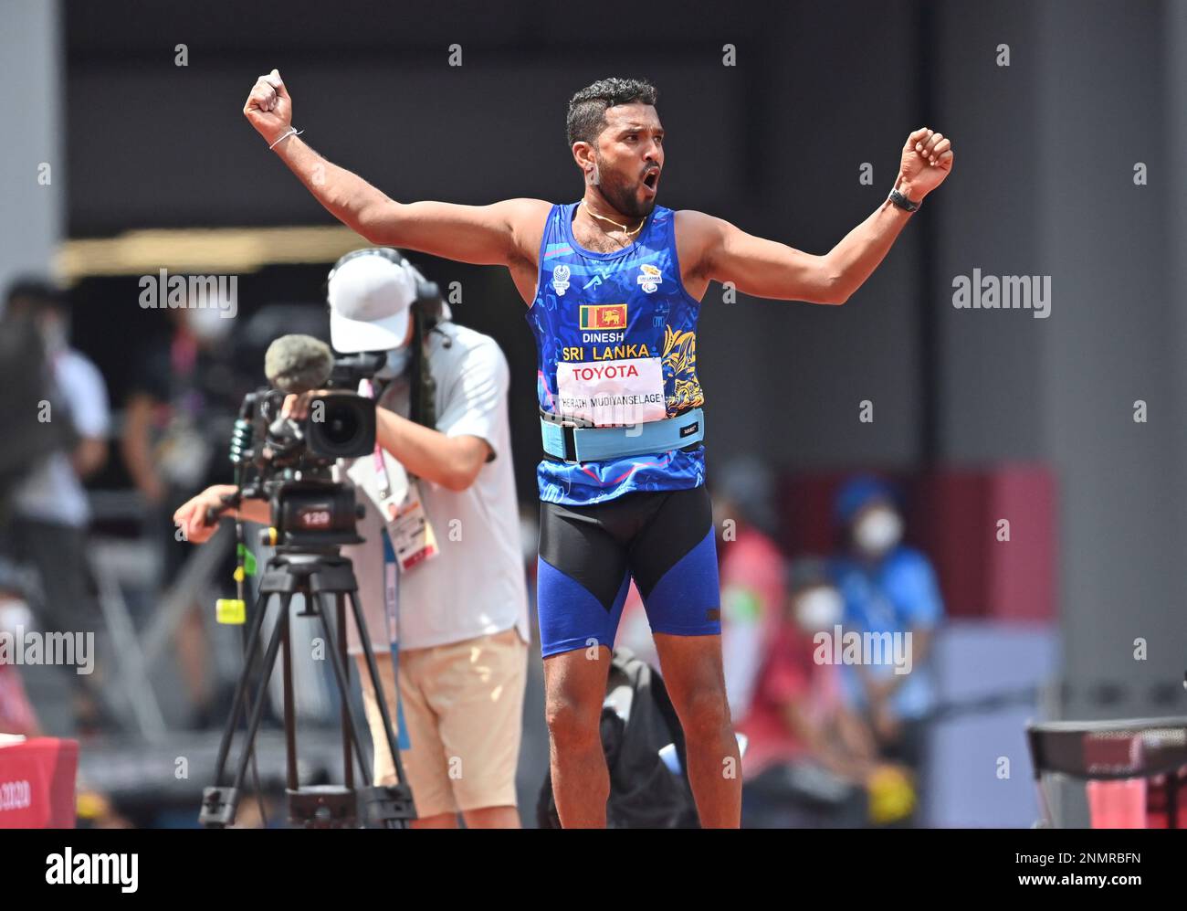 Sri Lanka's HERATH MUDIYANSELAGE Dinesh Priyan reacts after hitting a