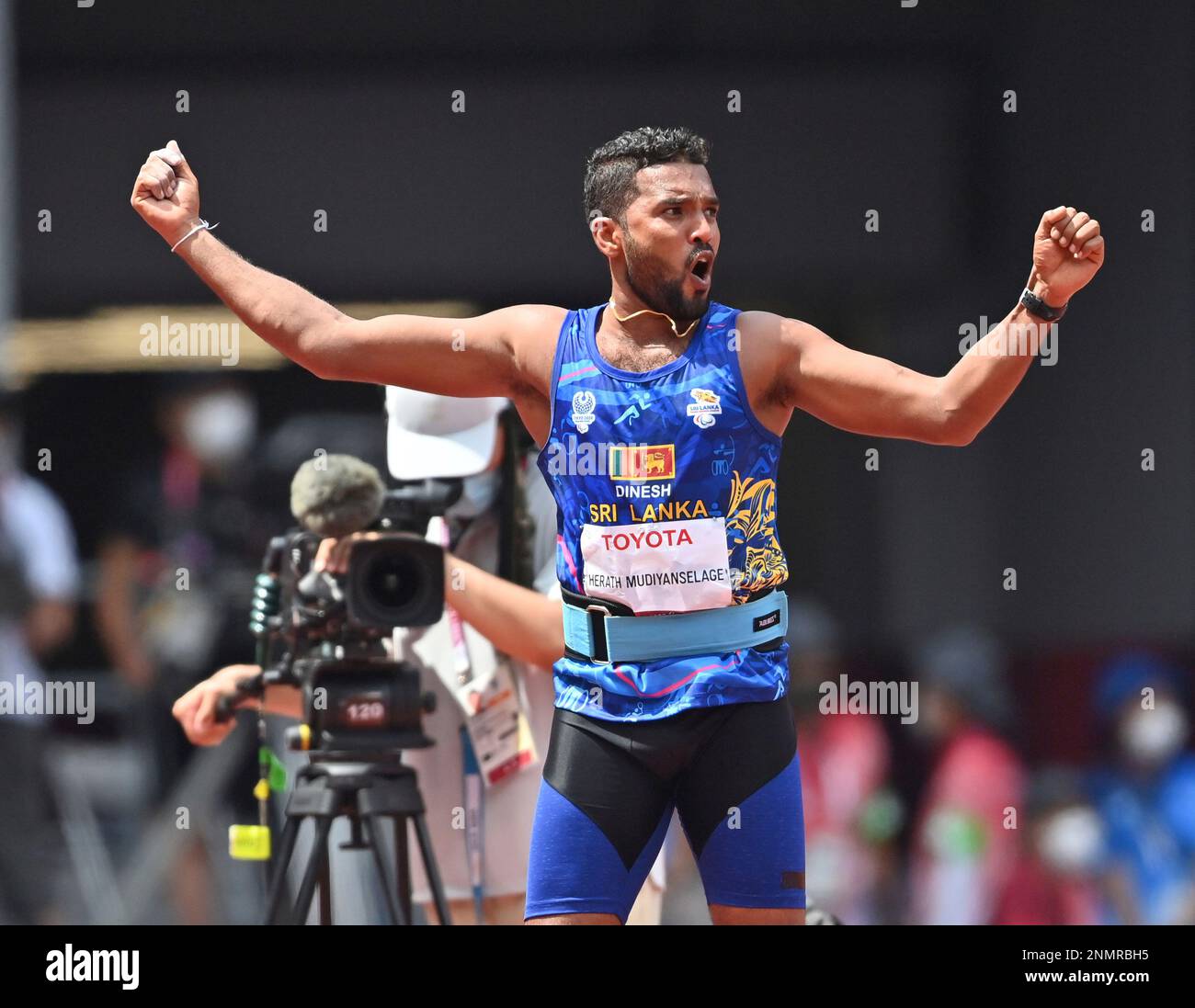 Sri Lanka's HERATH MUDIYANSELAGE Dinesh Priyan reacts after hitting a