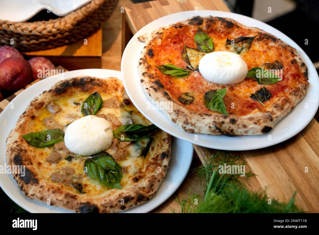 A detailed view of the Truffle and Margherita pizza served by San