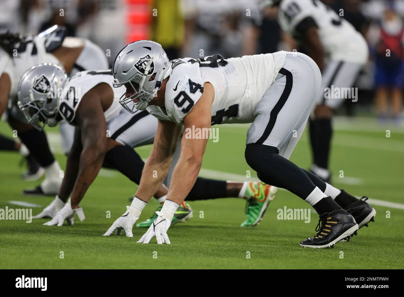 Las Vegas Raiders defensive end Carl Nassib (94) sits on the bench during  an NFL preseason football game against the Seattle Seahawks, Saturday, Aug.  14, 2021, in Las Vegas. (AP Photo/Rick Scuteri