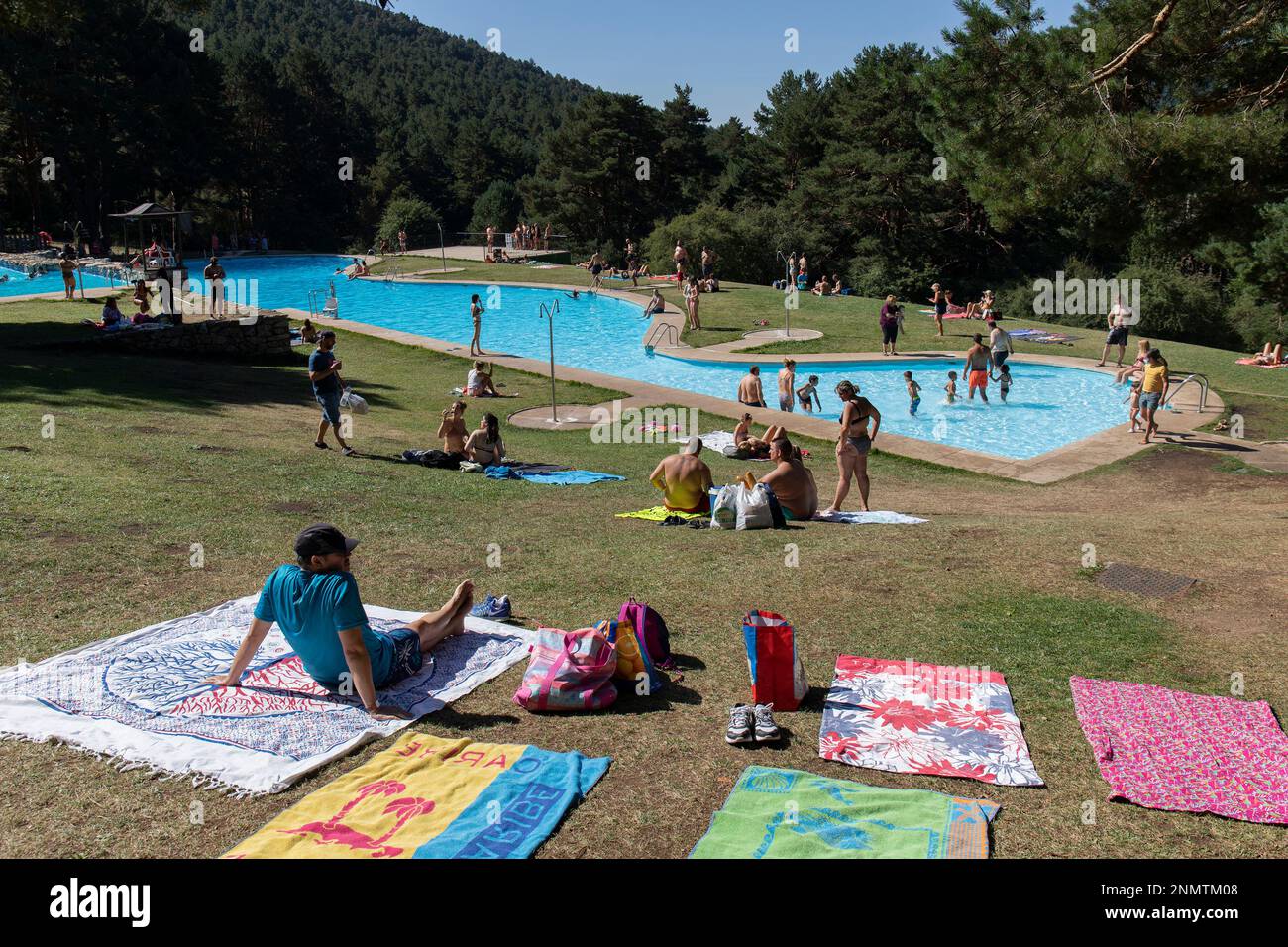 Several people enjoy a day of leisure at the swimming pools of Las Berceas,  August 14, 2021, in Cercedilla, Madrid, (Spain). These pools are located in  the Parque Recreativo de Las Berceas.