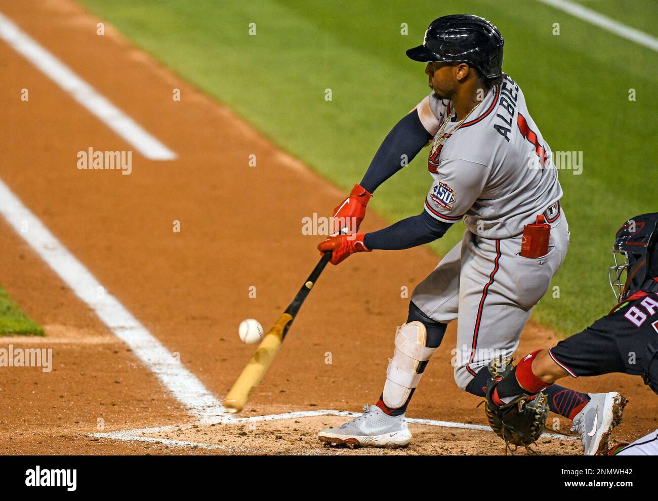 Atlanta Braves' Ozzie Albies smiles from the dugout during a baseball game  against the Miami Marlins, Sunday, Sept. 17, 2023, in Miami. (AP  Photo/Lynne Sladky Stock Photo - Alamy