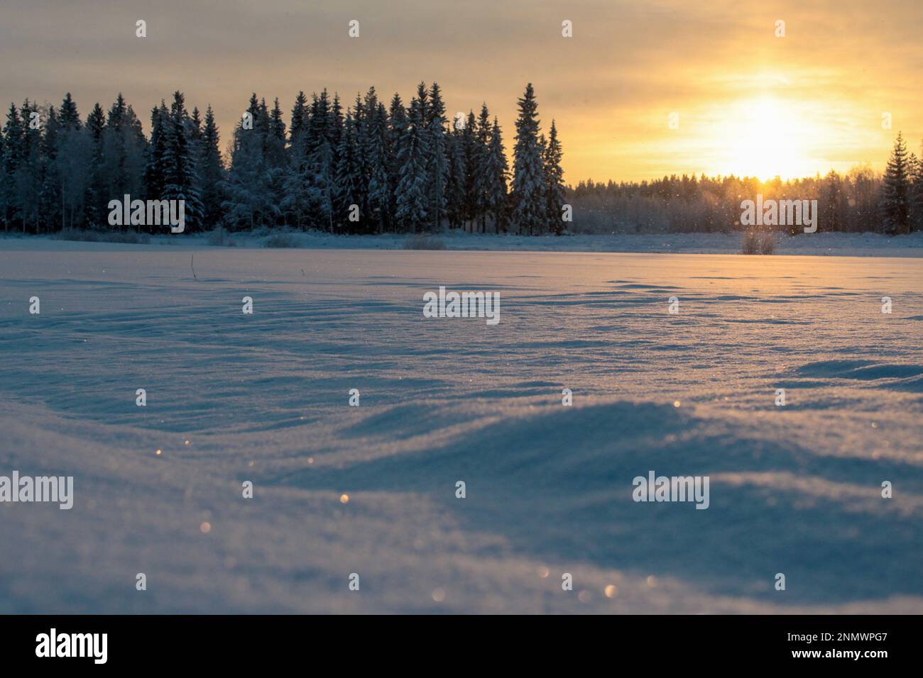 Golden sunset reflecting over frozen hi-res stock photography and ...