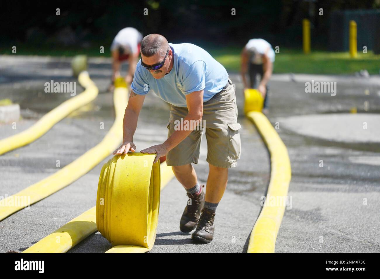 Dan McIntyre of Safety First Fire Equipment Testing rolls up an attack