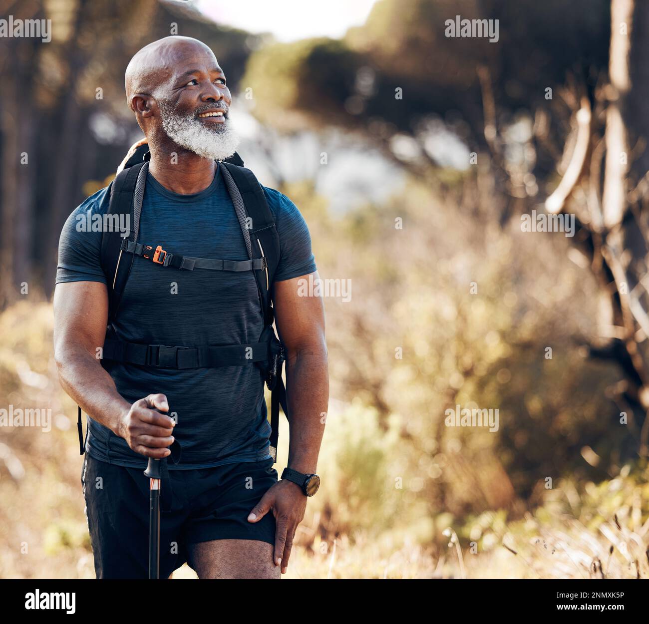Hiking, black man and travel adventure in nature forest for trekking,  fitness and cardio exercise. Senior person with backpack thinking and  walking Stock Photo - Alamy