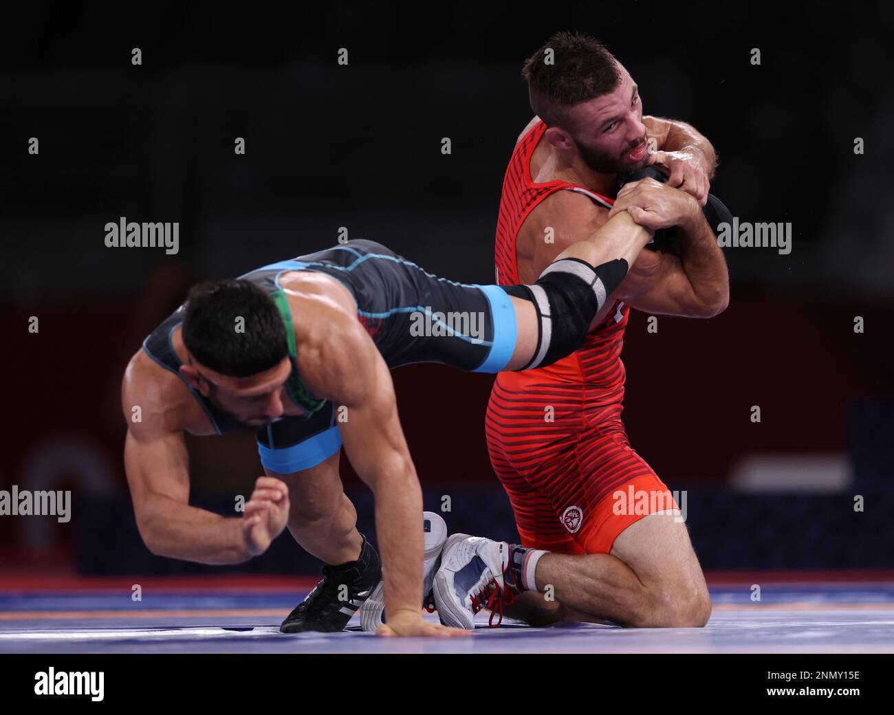 USA's GILMAN Thomas Patrick (red) and Iran's ATRINAGHARCHI Reza compete