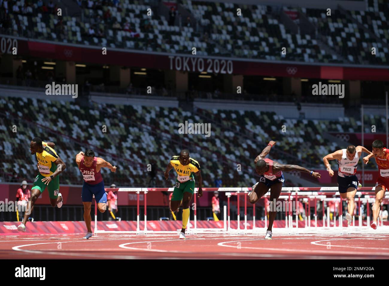 PARCHMENT Hansle (L, 7) of Jamaica crosses the finish line during the ...
