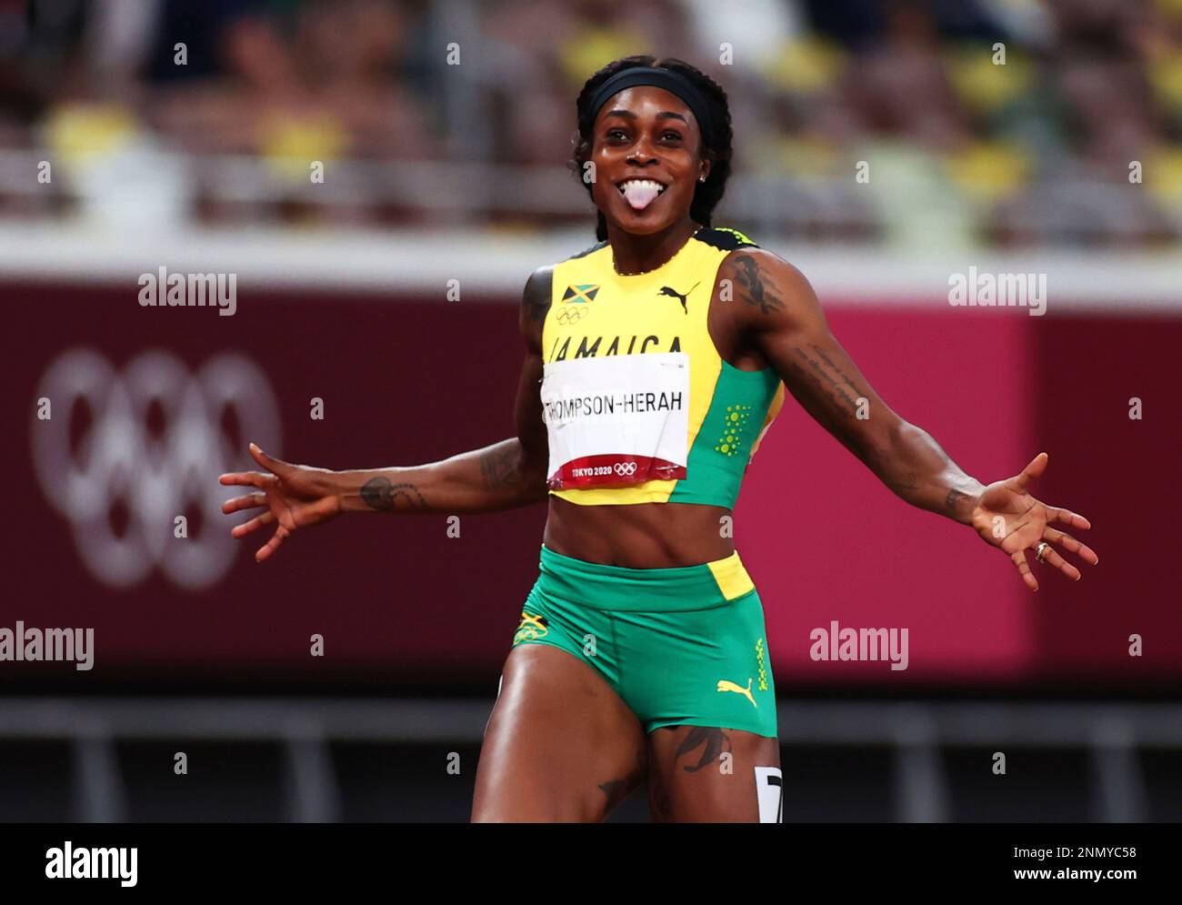 THOMPSON-HERAH Elaine of Jamaica reacts after winning Athletics women's ...