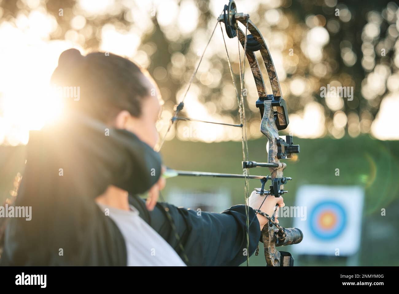 Archer woman, target and bow and arrow practice for outdoor archery, athlete challenge or girl