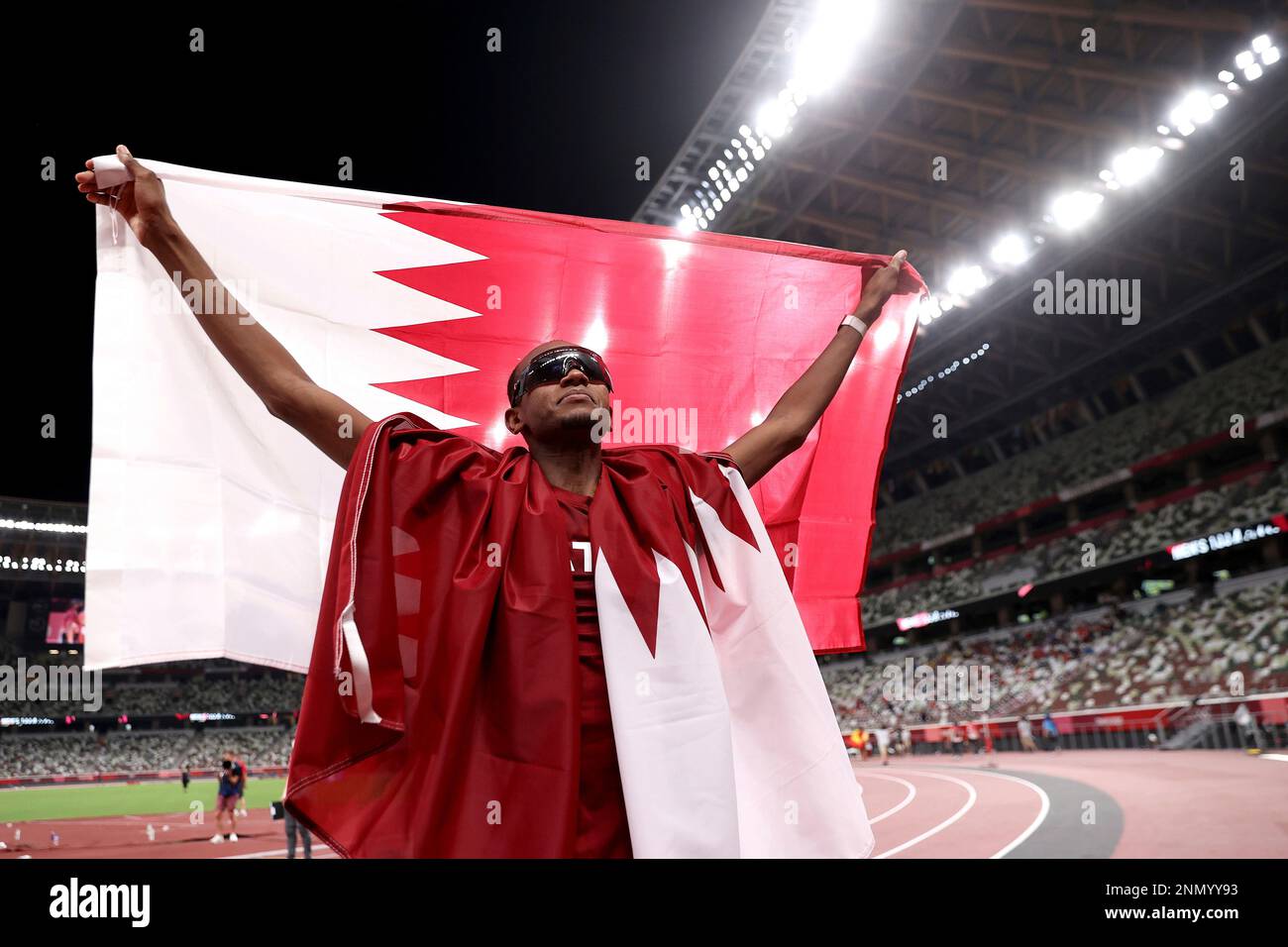 Gold medalist Mutaz Barshim of Qatar celebrates on the track after ...
